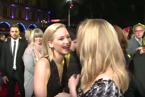 Jennifer Lawrence Accidentally Kisses Natalie Dormer at 'Hunger Games'  Premiere â€“ and She 'Liked It' (Video)