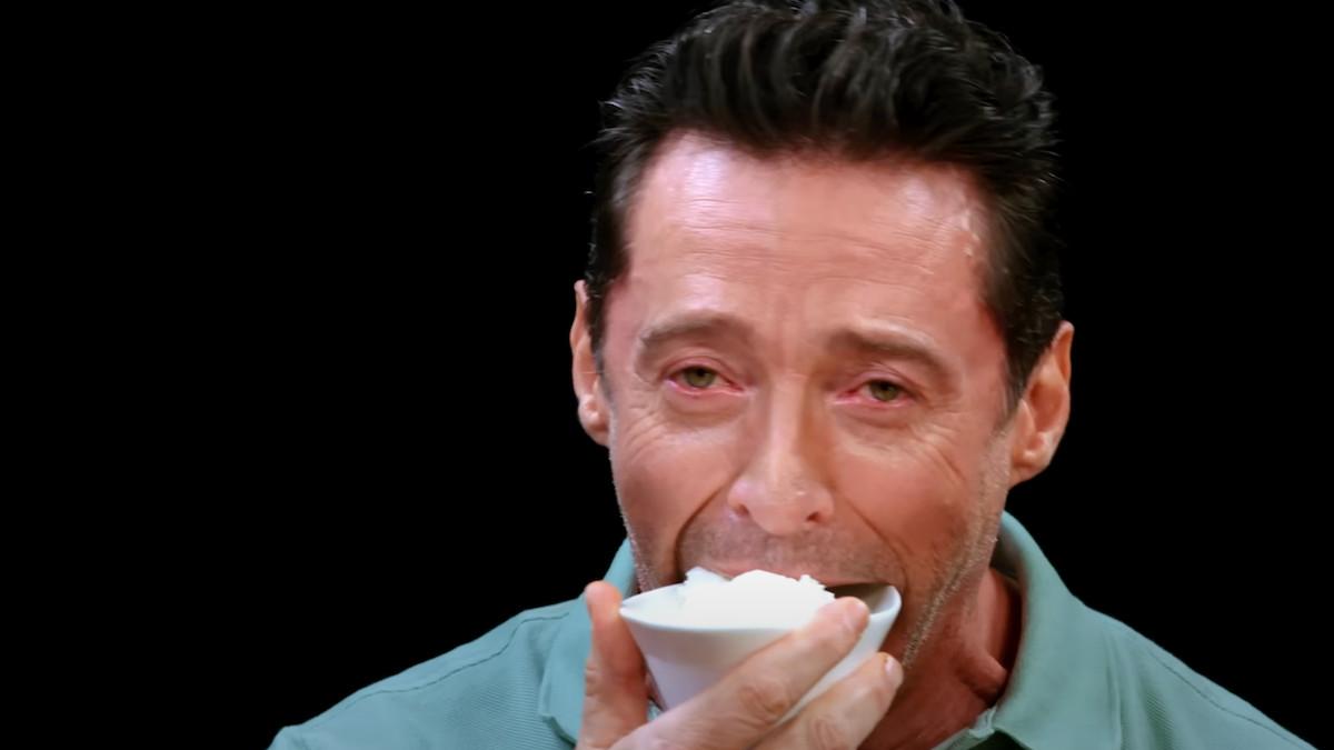 Hugh Jackman Gets Paranoid on ‘Hot Ones’ After Sean Evans Saves Him With Ice Cream, Says There’s ‘F–king Chili in It!’ | Video